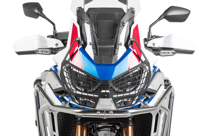 Захисна накладка на фару чорна з швидкознімним кріпленням для Honda CRF1100L Adventure Sports (-2023) "ЛИШЕ ДЛЯ ПОЗАШЛЯХОВОГО ВИКОРИСТАННЯ" від Touratech.