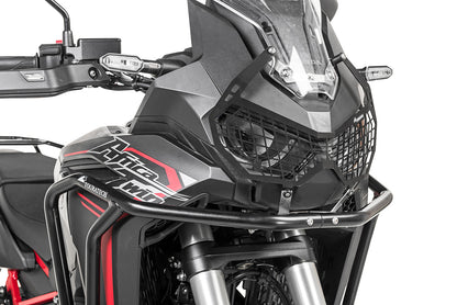 Захисна накладка на фару чорна з швидкознімним кріпленням для Honda CRF1100L Africa Twin (-2023) "ЛИШЕ ДЛЯ ПОЗАШЛЯХОВОГО ВИКОРИСТАННЯ" від Touratech.